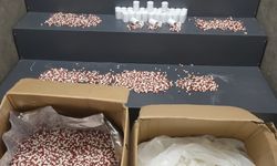 İzmir'de bir evde 104 bin 40 sentetik ecza ele geçirildi