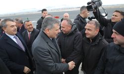 Bakanlar Tekin ile Çiftçi Erzurum'da meşaleler ve bar gösterisiyle karşılandı