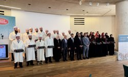 Almanya'da DİTİB'in eğittiği din görevlileri düzenlenen törenle cübbelerini giydi