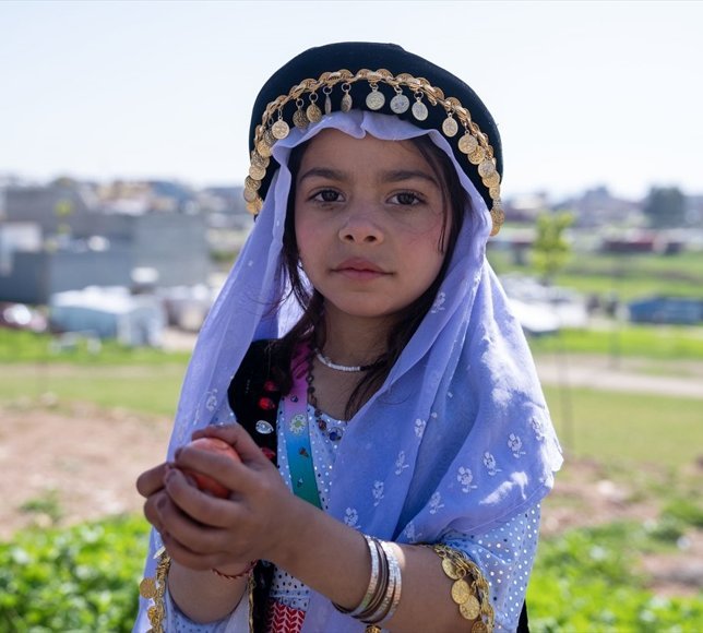 Irak'ın Duhok kentinde yaşayan Ezidiler, bu sene yeni yıl bayramlarını evlerinde kutladı