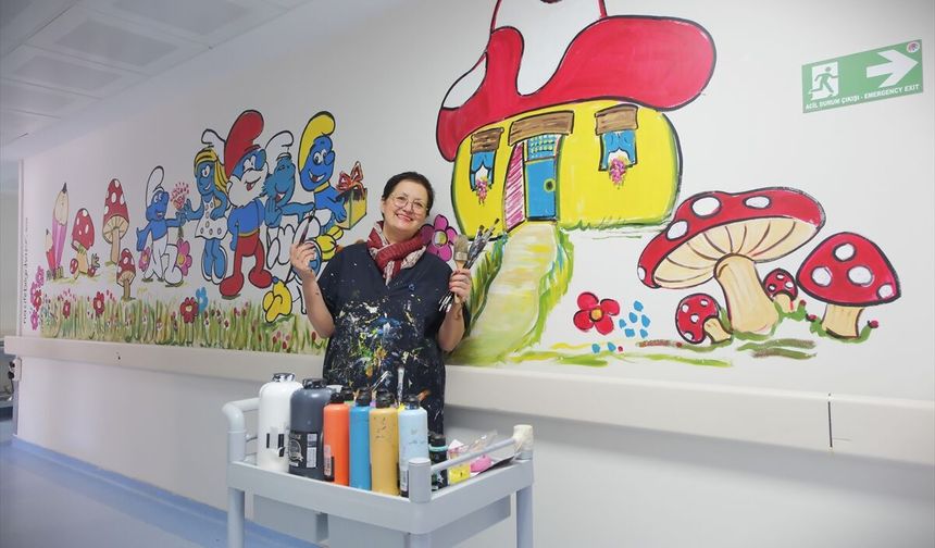 Çocukların moral bulması için hastane duvarlarını resimlerle renklendirdi